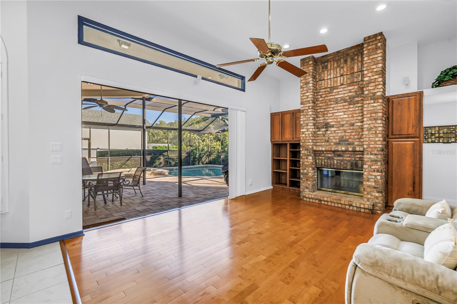 12 Foot ceilings in this open Great Room with Triple 8-Ft Sliders which pocket and open the inside to the outside.  Literally amazing outdoor living.  SEE VIRTUAL RENDERING IN PHOTO 58