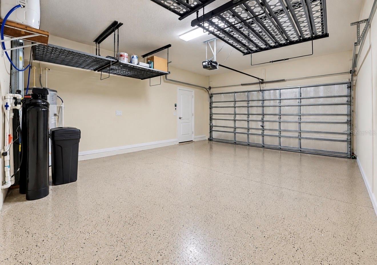 Double Garage with Overhead Racks and Water Softener