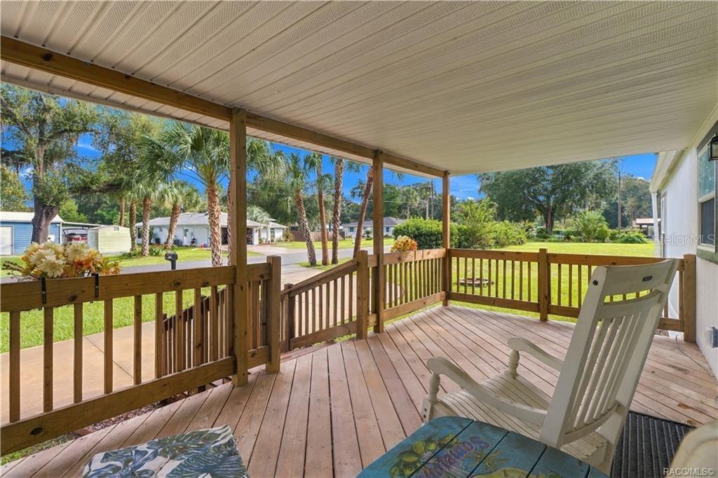 Covered Front Porch Picture yourself enjoying morning coffee or a quiet afternoon on this spacious covered porch overlooking the front lawn & neighborhood. Covered Front Porch Picture yourself enjoying morning coffee or a quiet afternoon on this spacious covered porch overlooking the front lawn & neighborhood.