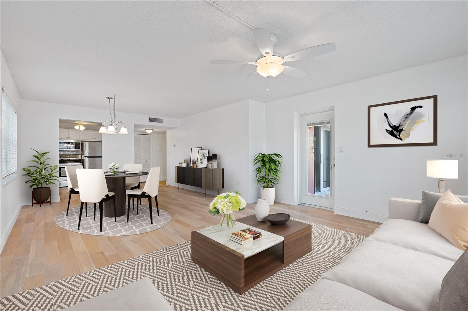 Access to balcony to the right, kitchen in the back left by the front door
