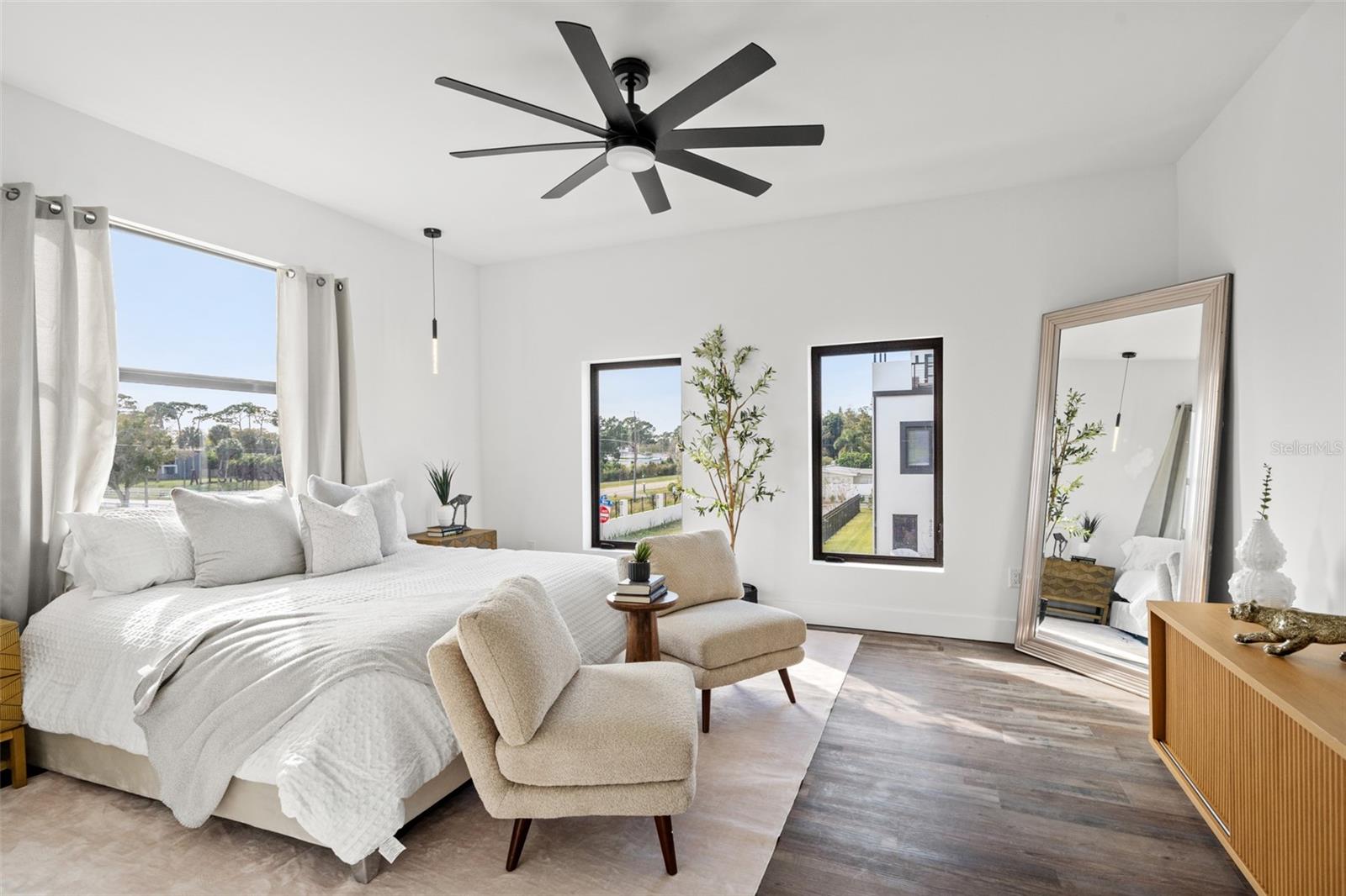 Primary bedroom in a completed model residence