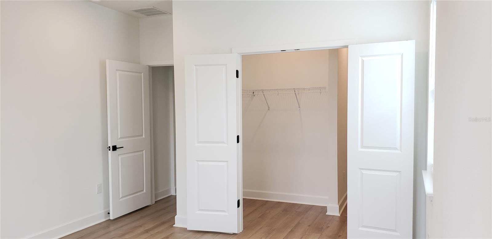 Primary Bedroom & Walk in Closet