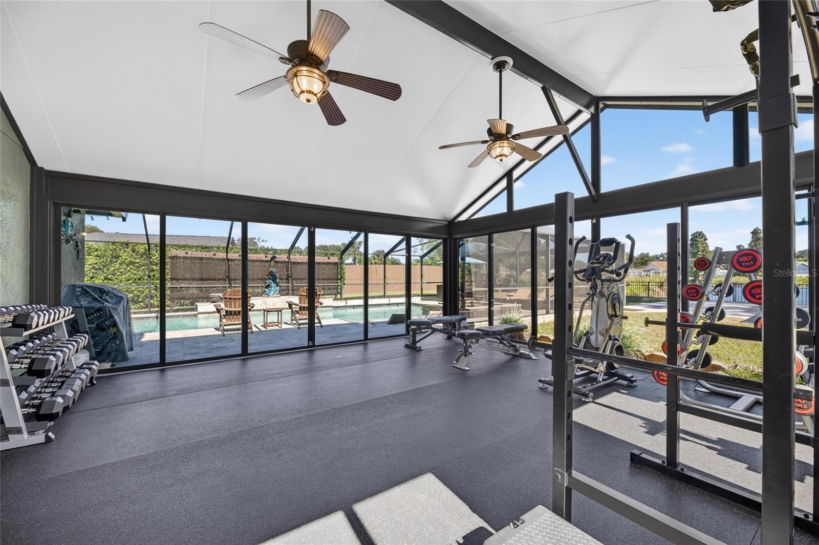 Professional grade gym showing sliders to outside area