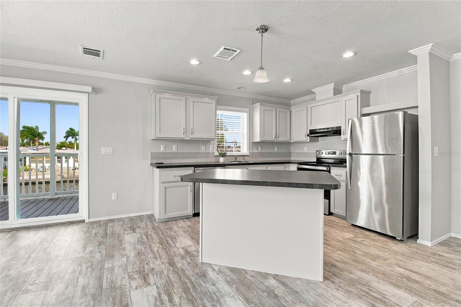 Open Concept Kitchen, LR & DR