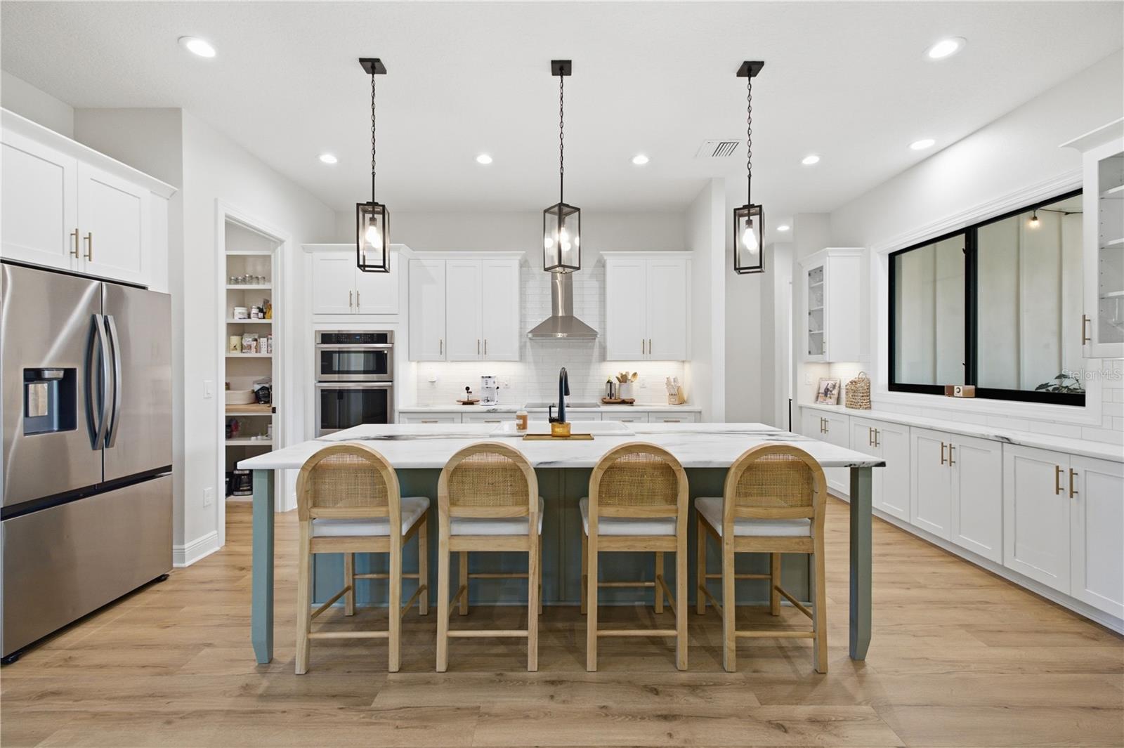 Huge Island (over 9 FT) and leathered granite countertop.