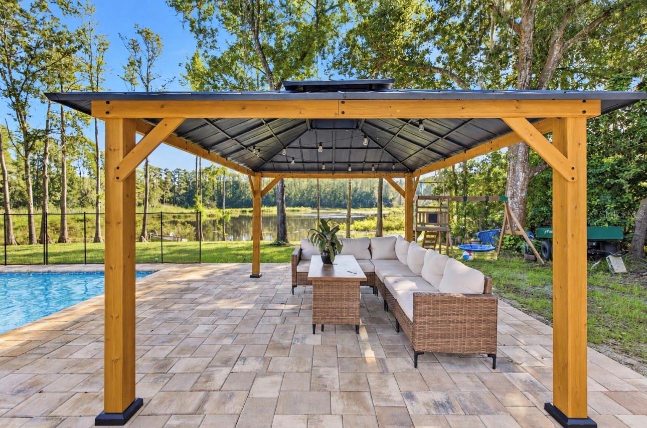 Pergola by the pool for hang sessions and eating fully outdoors!