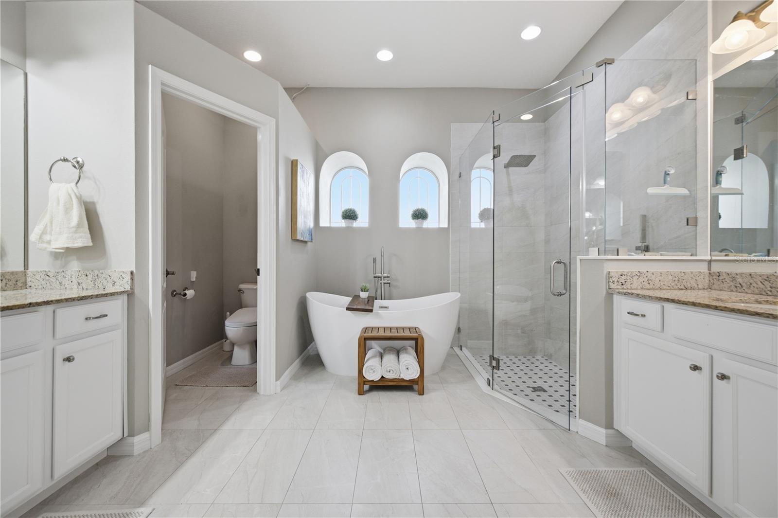 Updated Primary Bathroom, with double vanities.