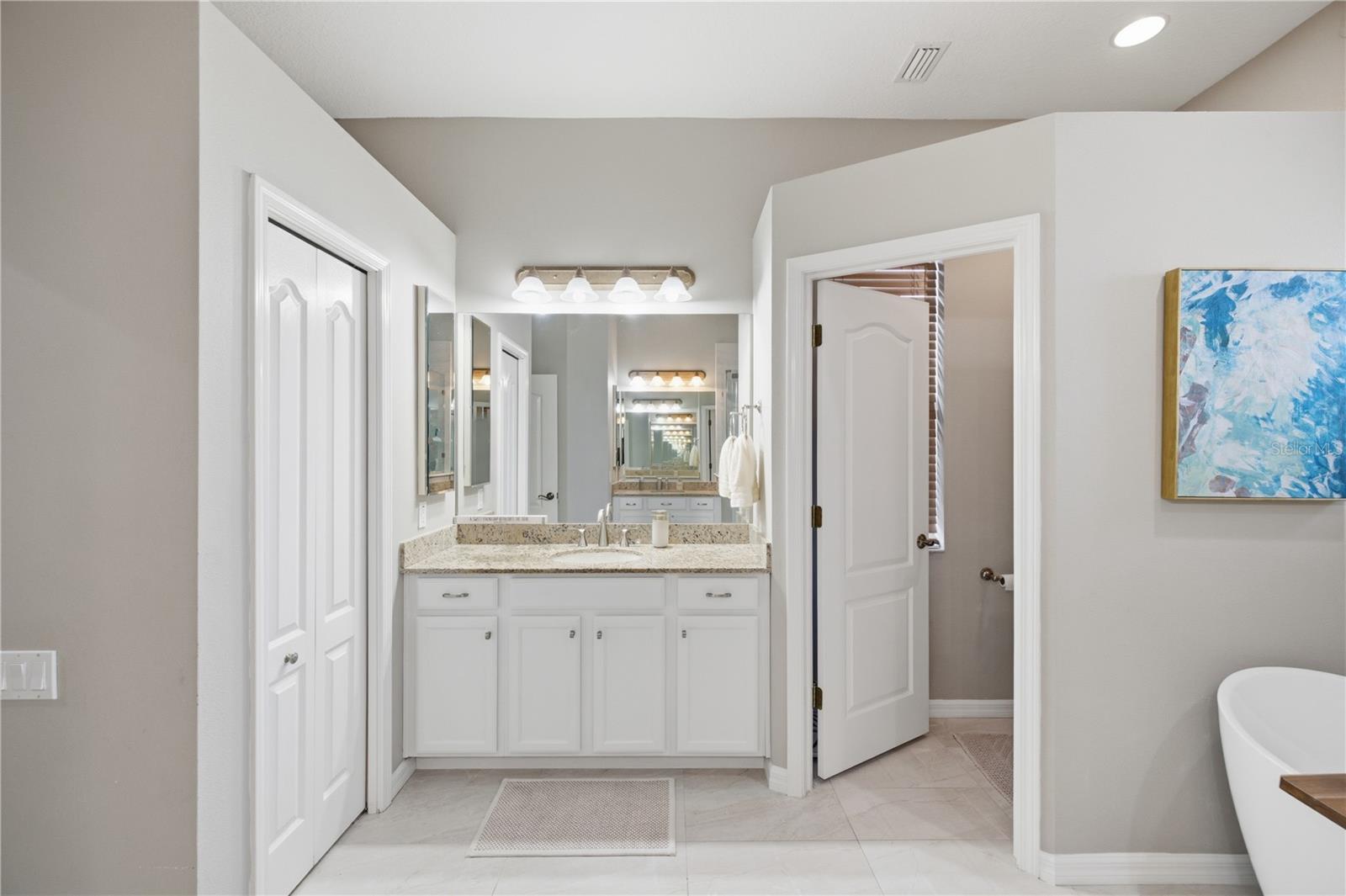 Split Vanities and Linen Closet.