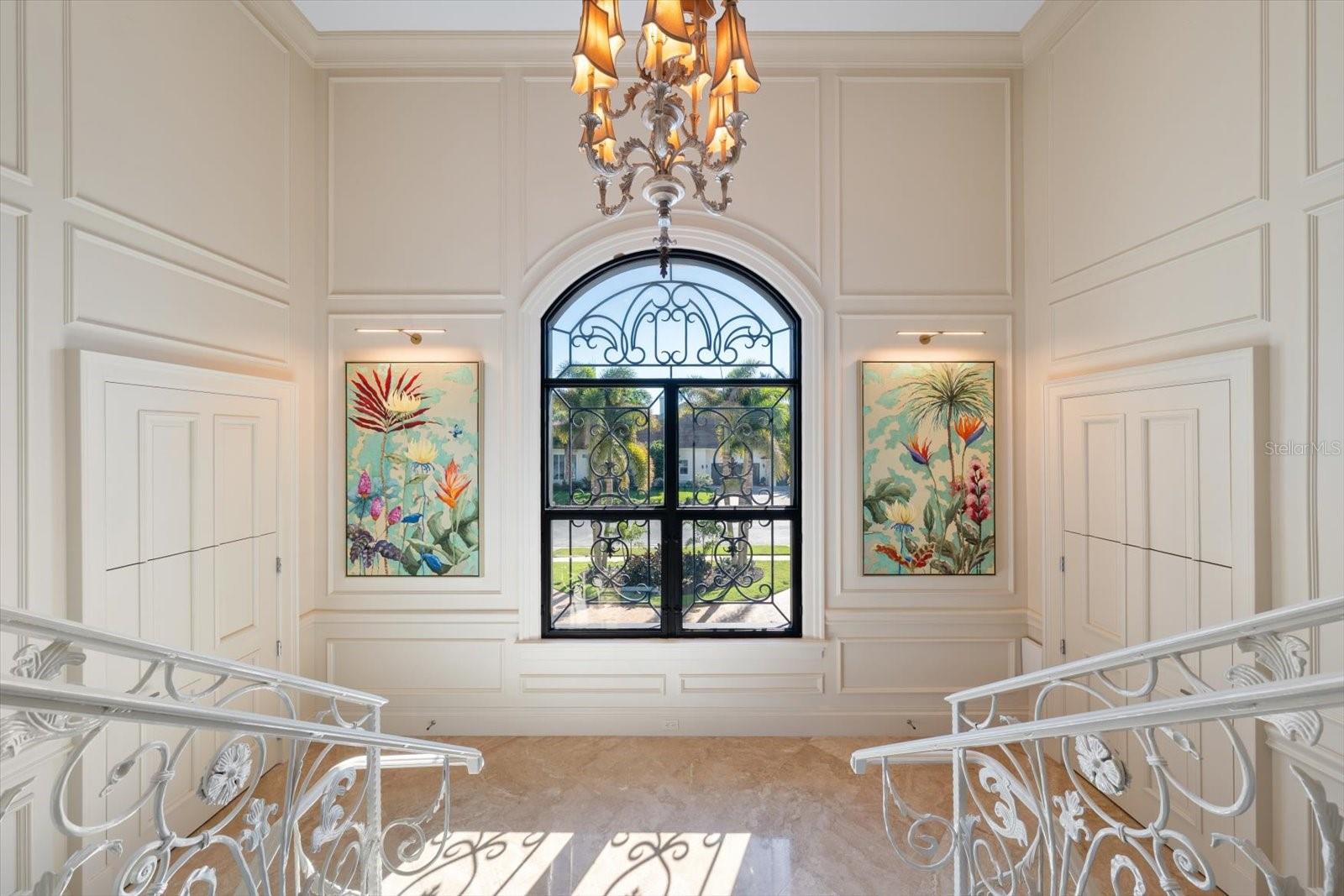 Grand, Timeless Details. Two storage closets perfectly tucked away on this landing.