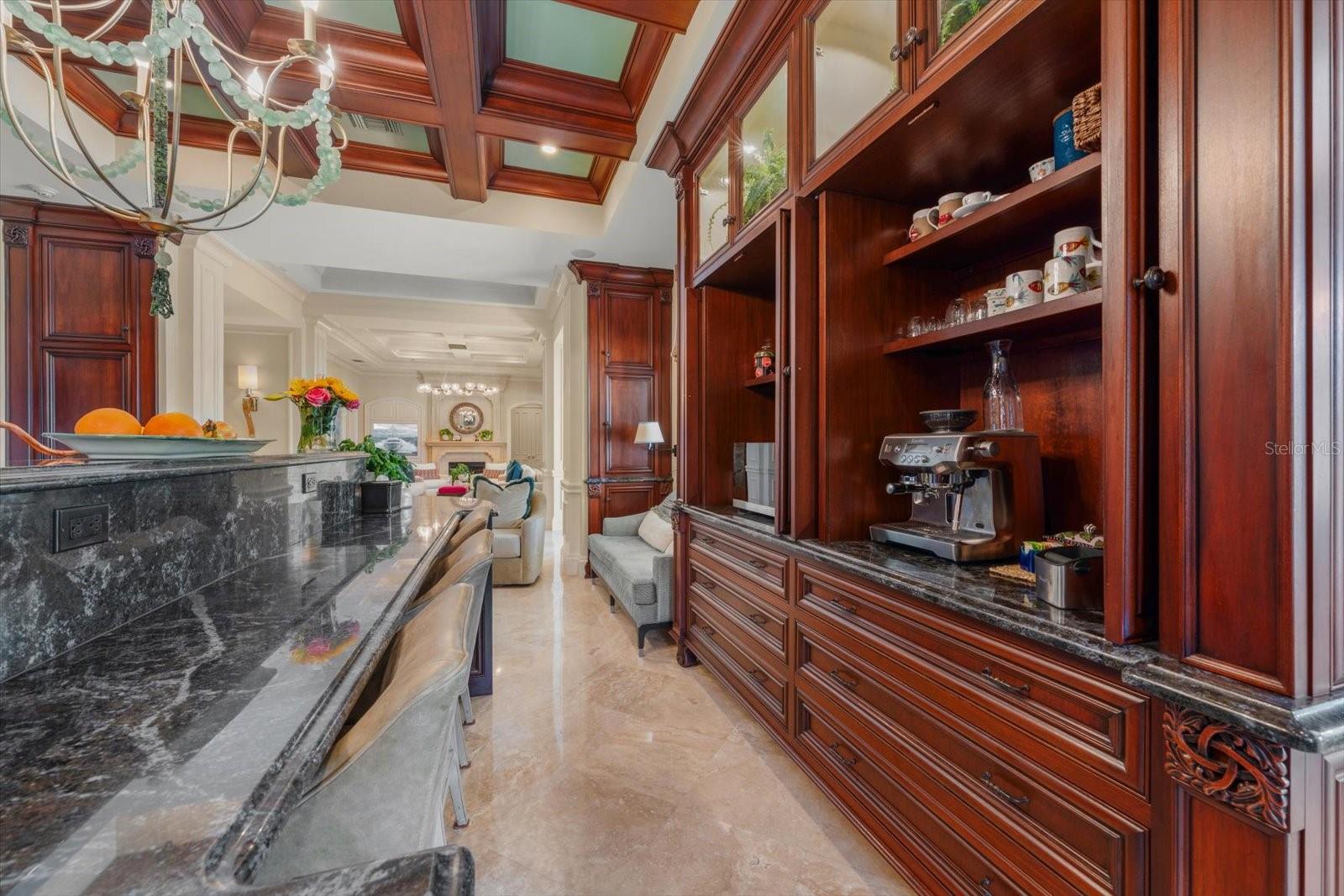 Floor-to-ceiling Furniture Style Solid-Wood Cabinetry! Keep them opened for easy access, or close them off while entertaining!