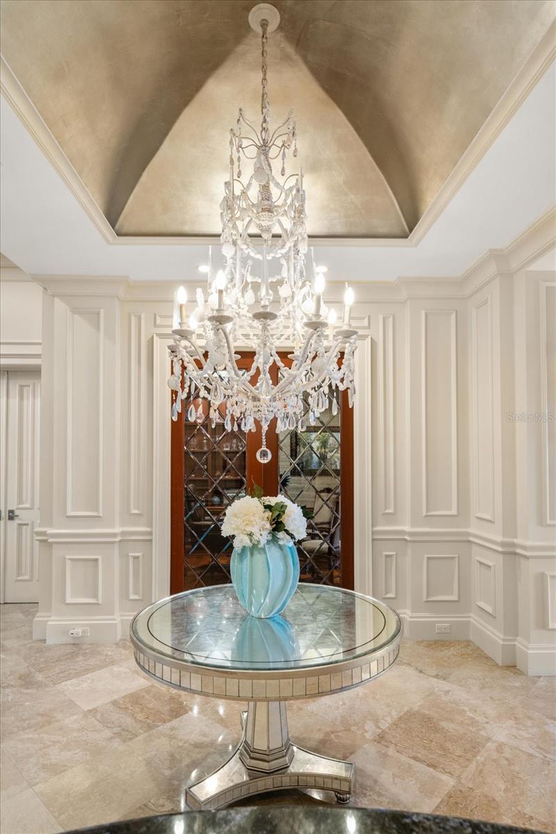 Elegant, High-End Light Fixtures throughout. Here is a Unique Chandelier with Gold Leaf Dome