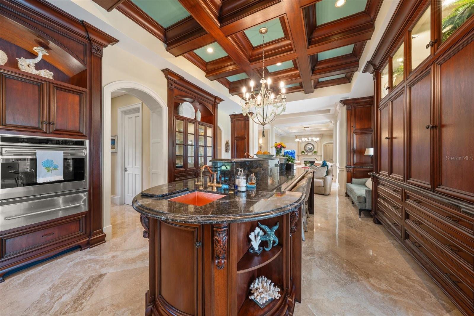 Impressive 13-foot island with two copper sinks