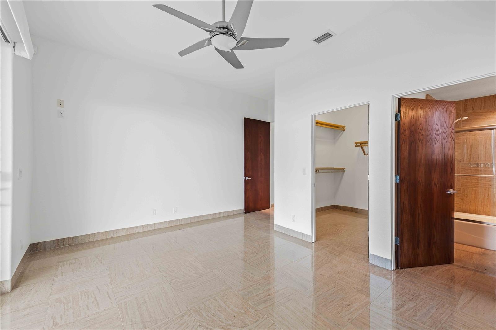 Bedroom 2 with balcony and a view (w/ en suite)