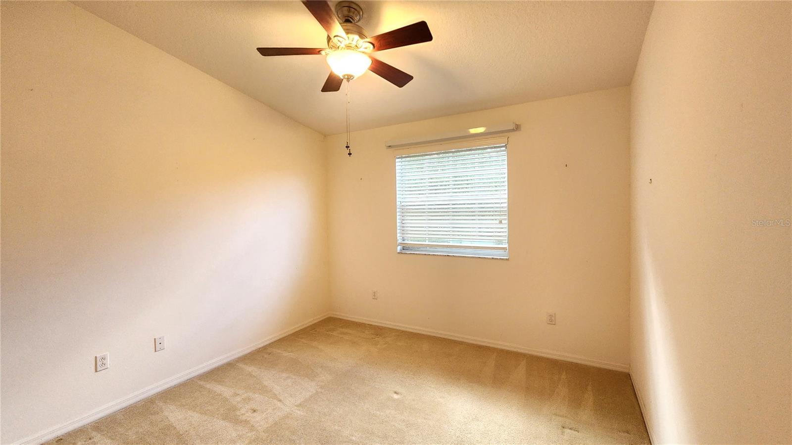 3rd Bedroom Upstairs at rear of property.