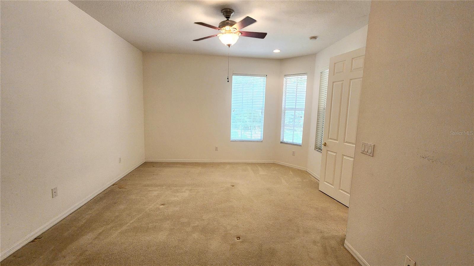 Large primary bedroom on ground floor.