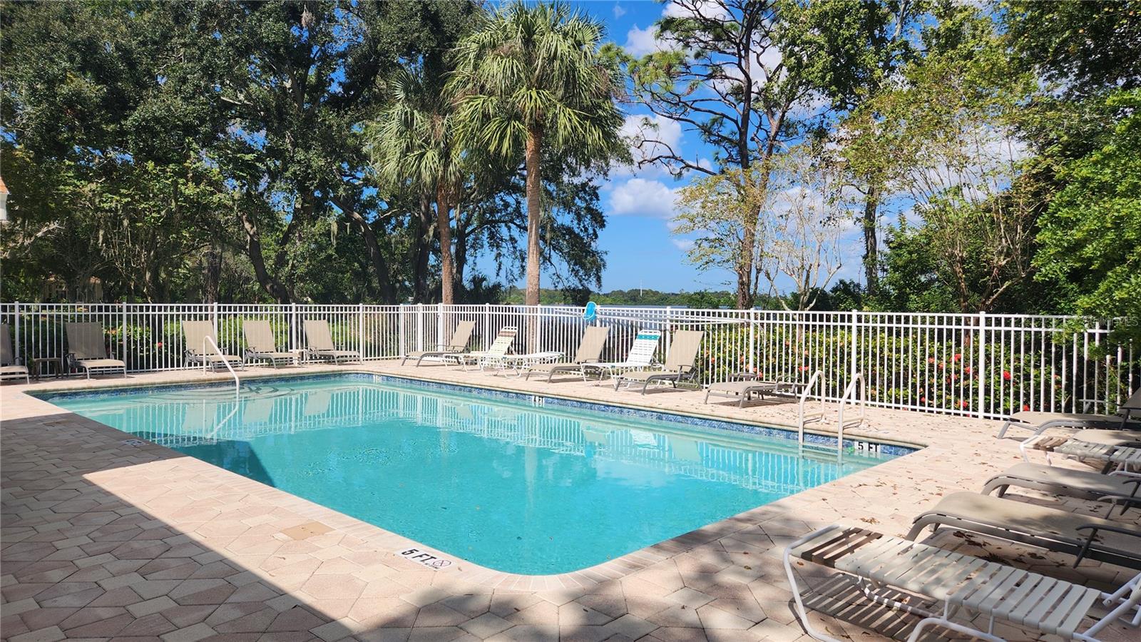 Pool overlooking lake.