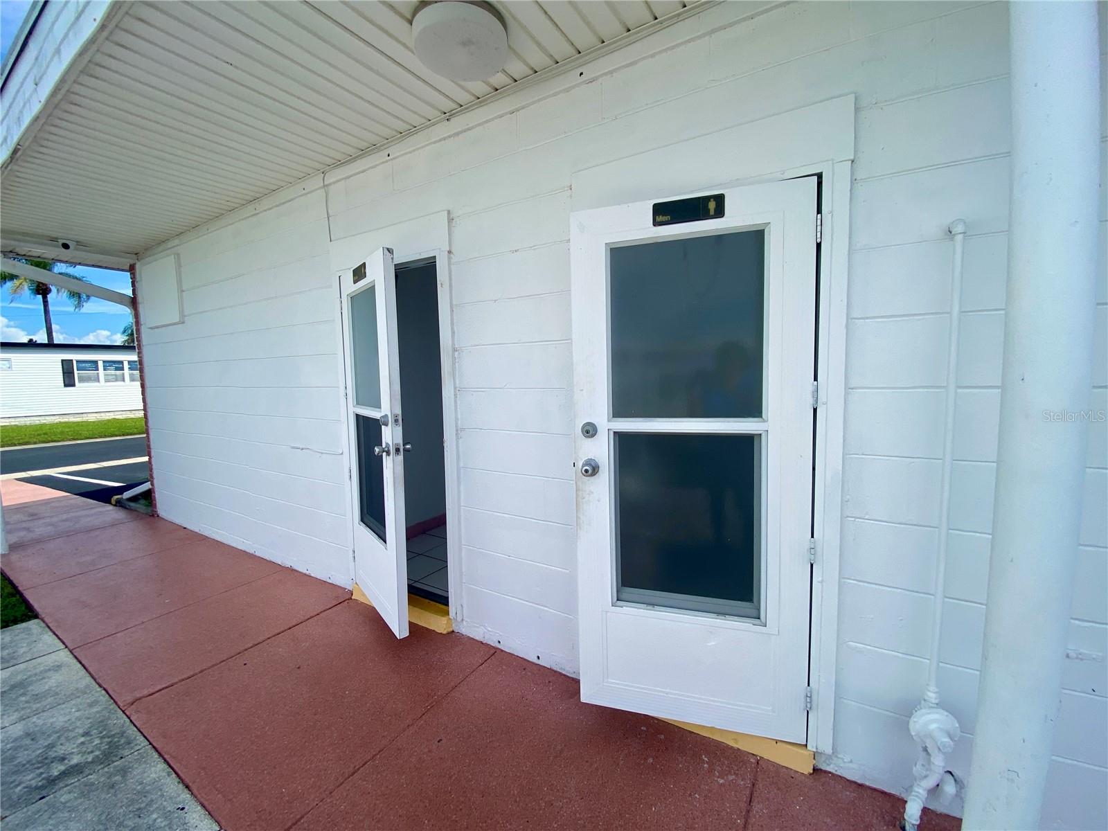 Restrooms for shuffleboard/laundry