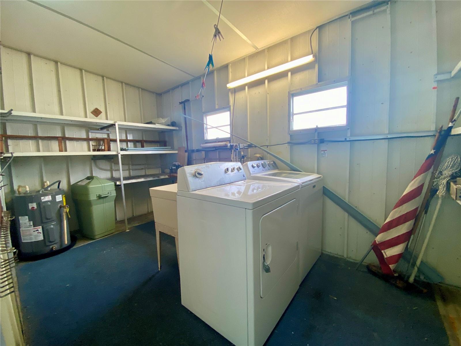 Utility Shed:washer, dryer, 2021 Hot water heater, slop sink