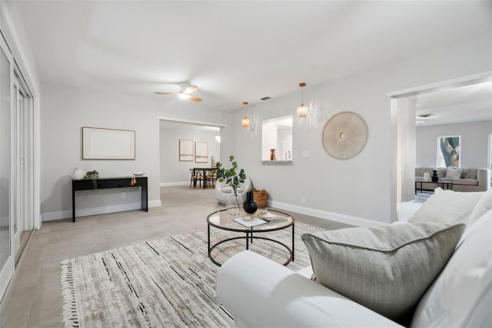 A separate living room and family room, provide flexibility for gathering and entertaining.