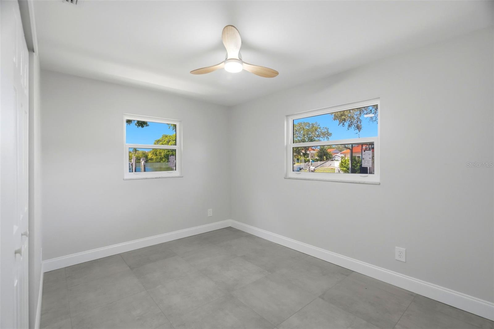One of four bedrooms with a water view.