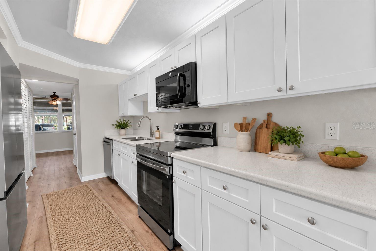 Virtually Staged: Kitchen with New Appliances and Cabinets/Counters