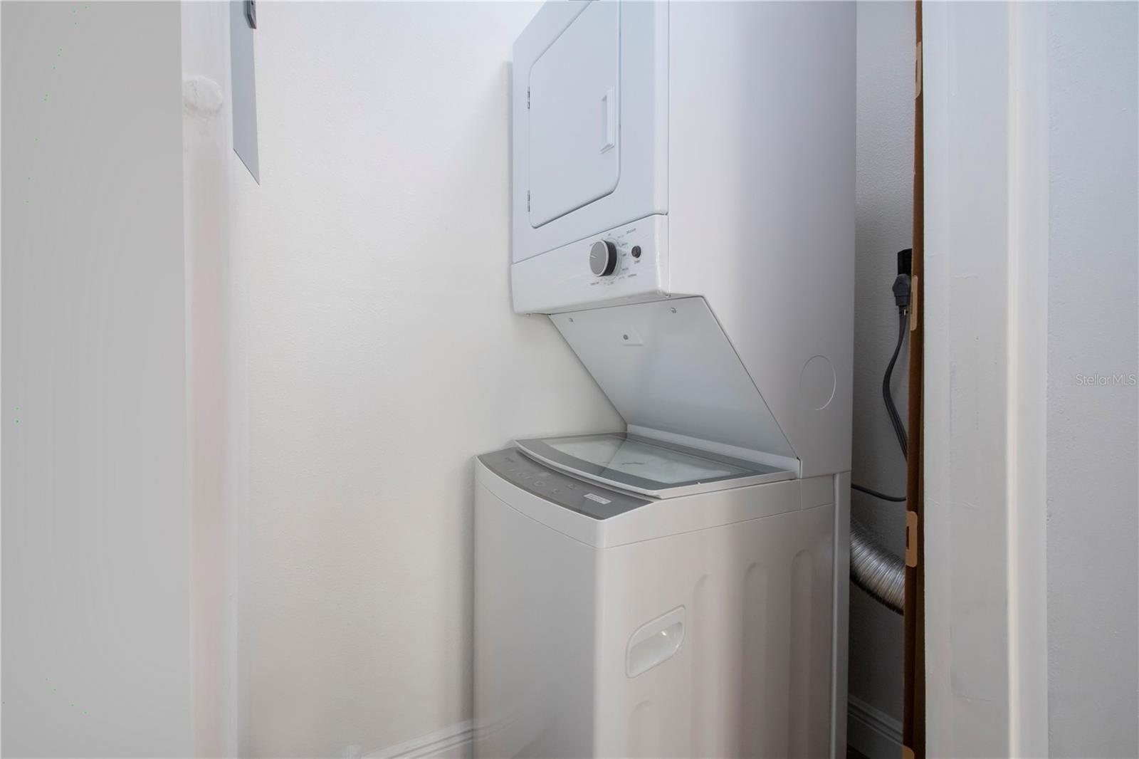 Laundry and storage area room off lanai