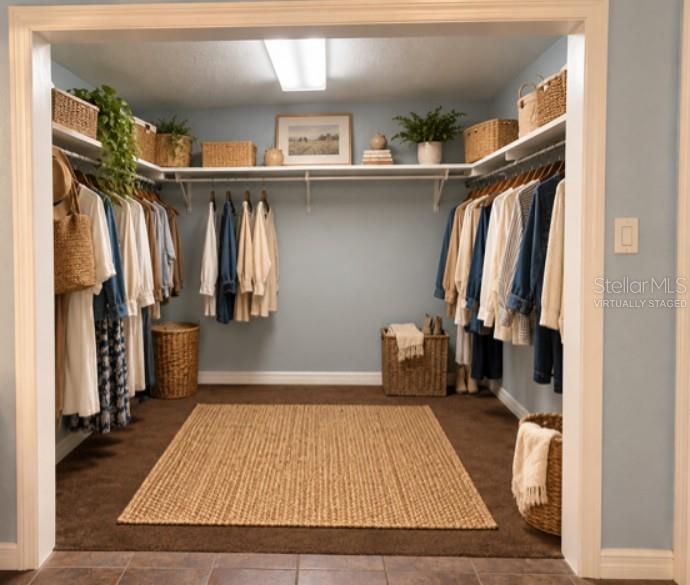 Virtually staged. There is no area rug. House is not furnished.