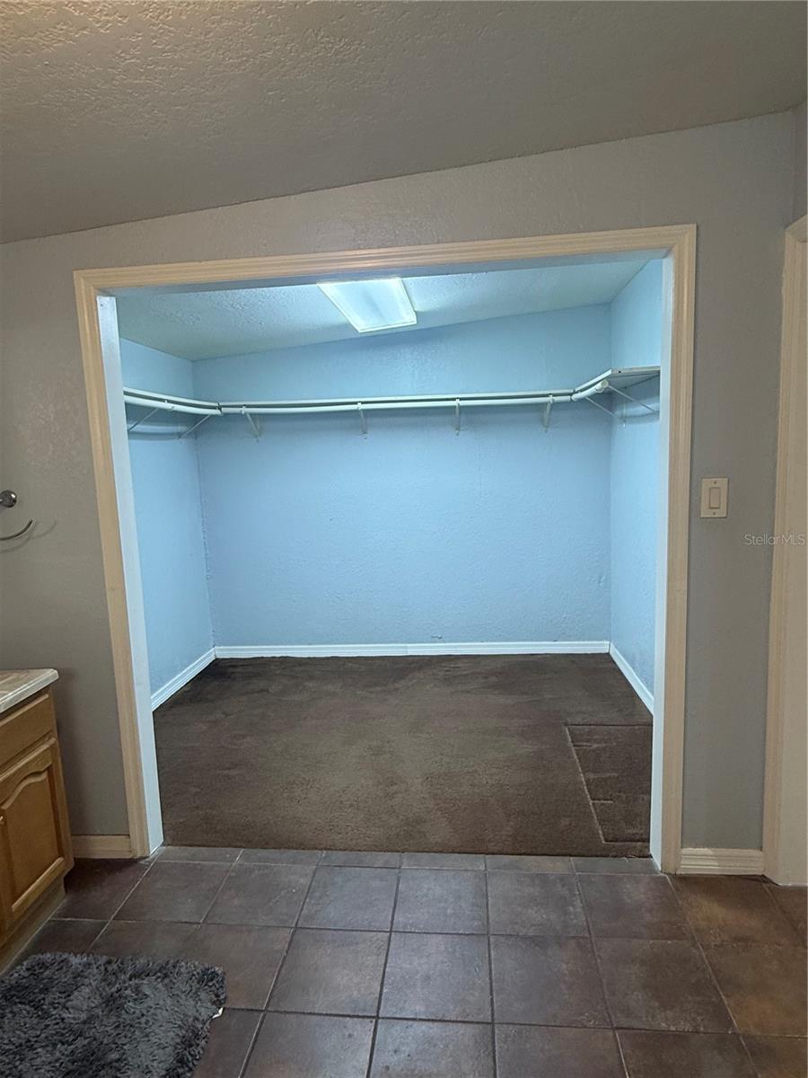 Master bedroom walk-in closet, not staged