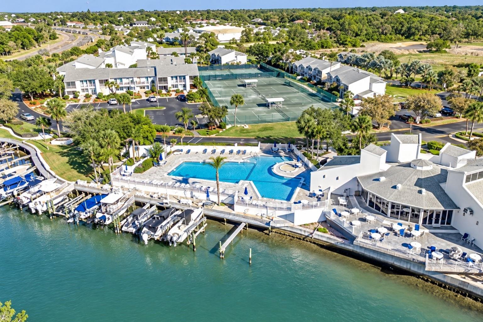 AERIAL OF MARINA, POOL & TENNIS/PICKLEBALL COURTS