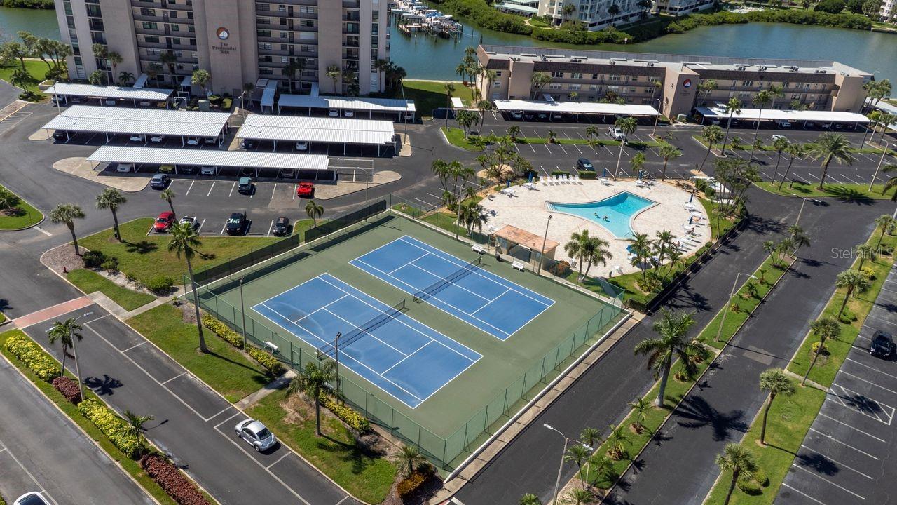 Central pool , tennis courts