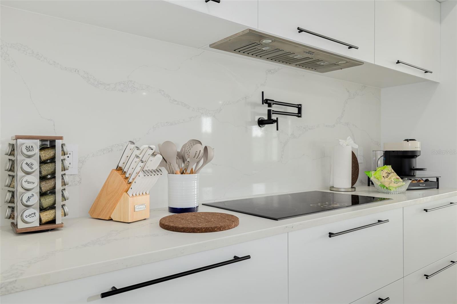 Pot filler and induction stove top.