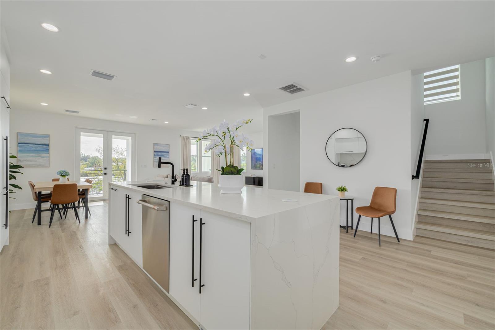 Open floor plan with natural light flowing in all over.
