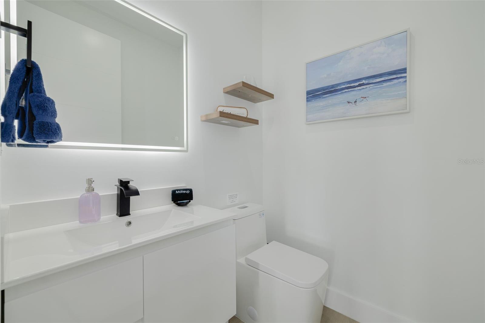 Half bathroom on the main floor just off the kitchen.