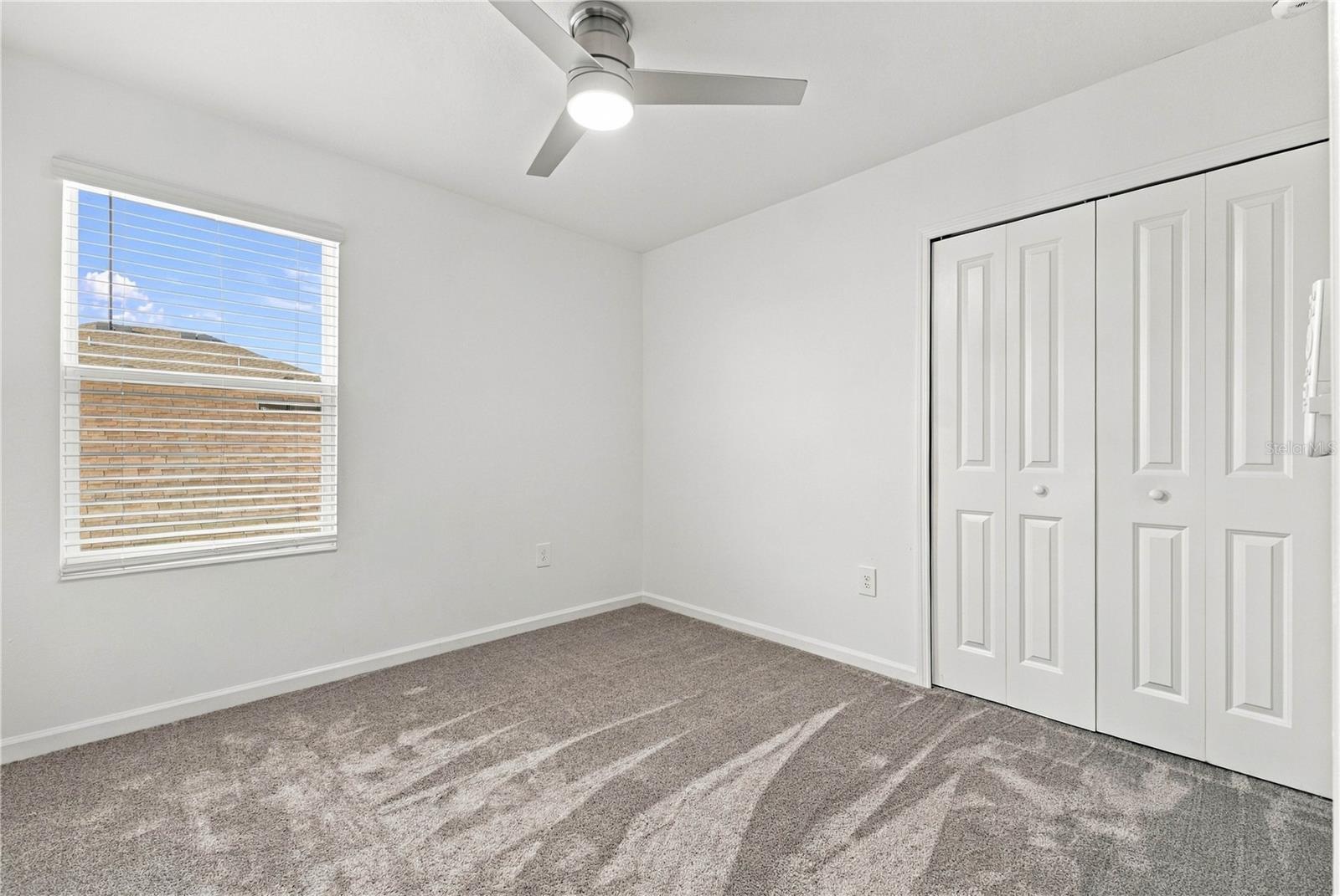 Bedroom with Double-Door Closet