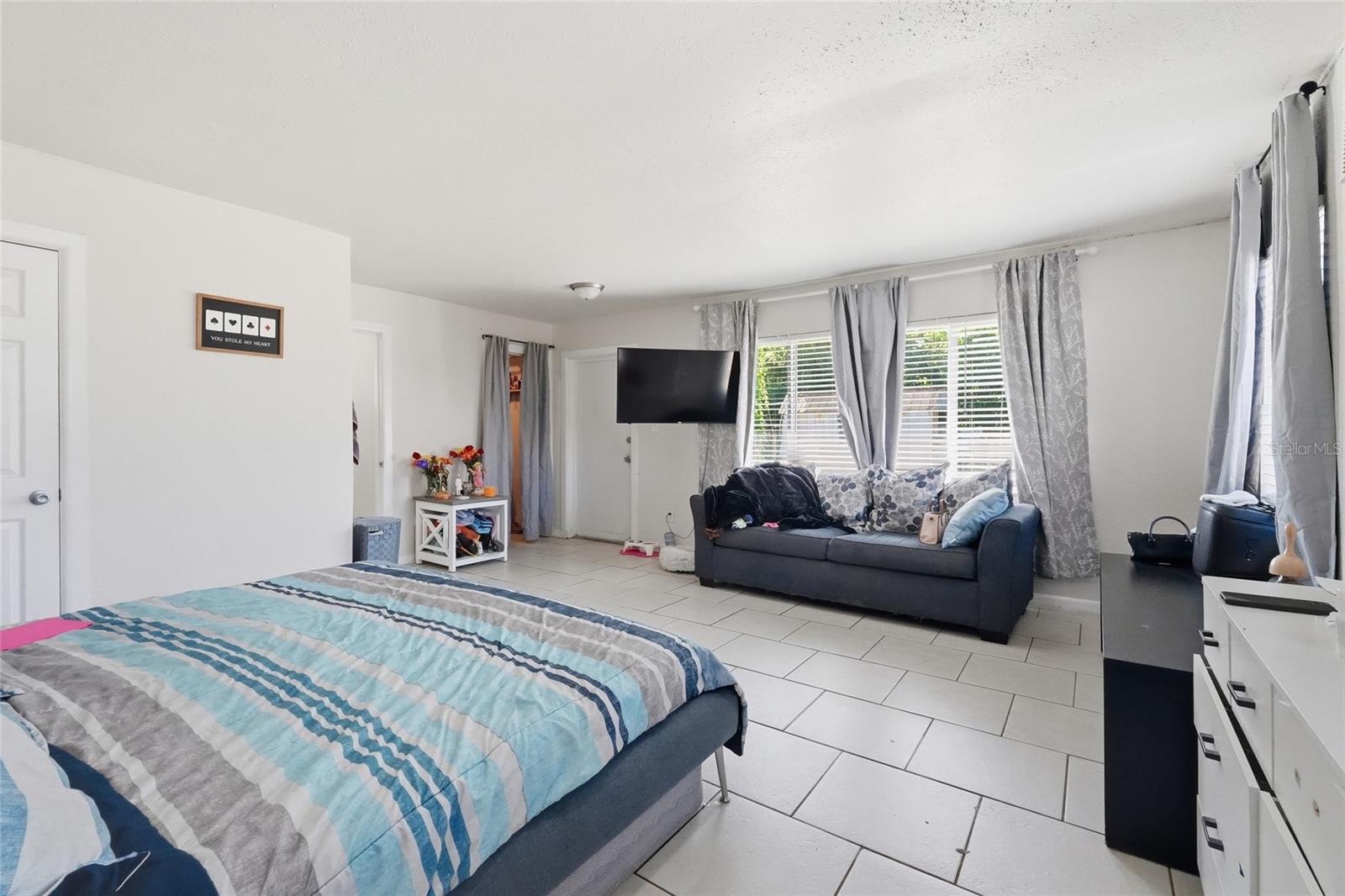 Primary bedroom 2420 with 1/2 bath and laundry