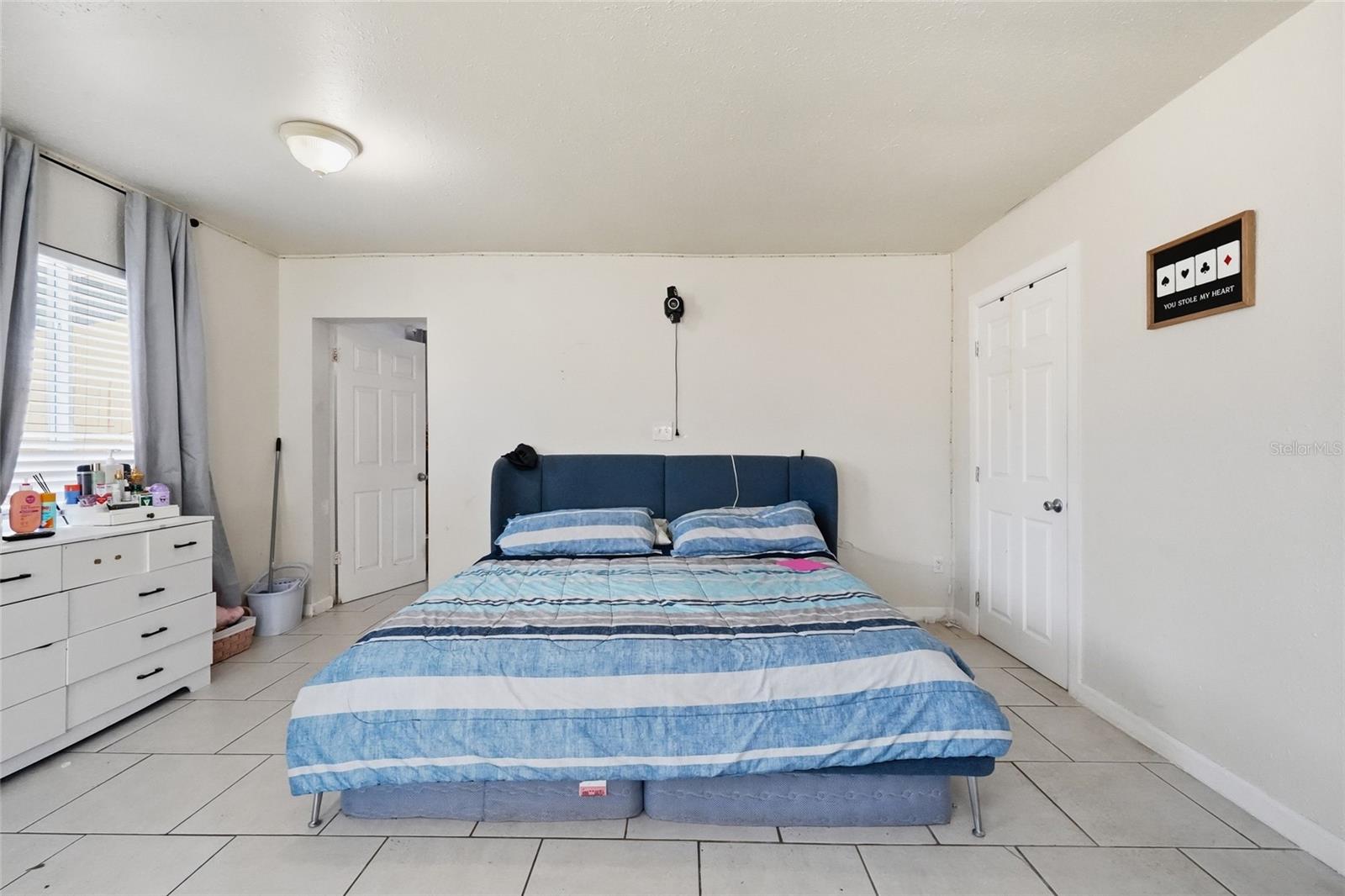 Primary bedroom 2420 with 1/2 bath and laundry