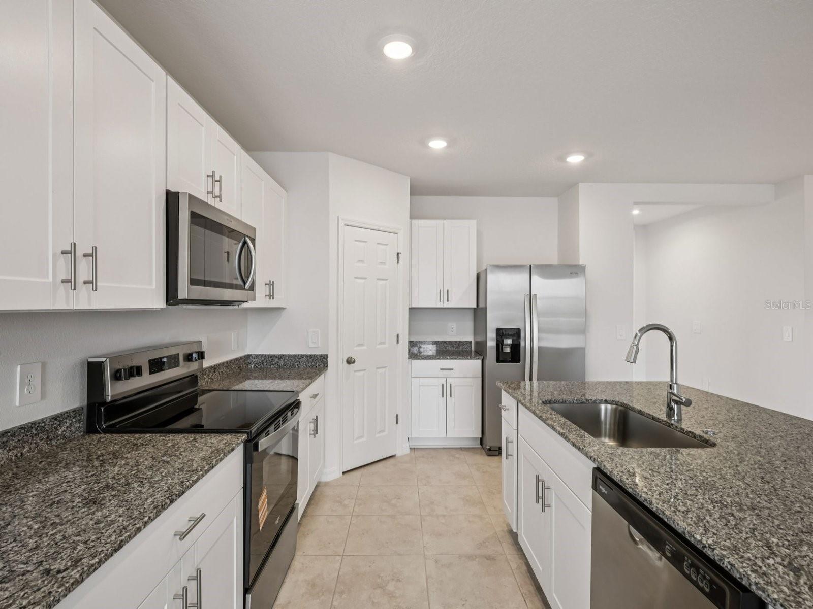 Can you make this description for VillaMar for MLS with a warm but sales appeal: This versatile floorplan offers four bedrooms, two full baths and family room, complemented by an open-concept kitchen, dining area, and great room designed for gathering and entertaining.