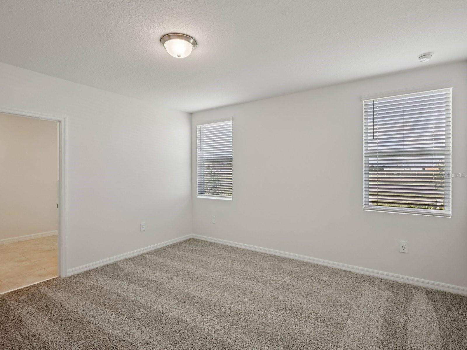 Can you make this description for VillaMar for MLS with a warm but sales appeal: This versatile floorplan offers four bedrooms, two full baths and family room, complemented by an open-concept kitchen, dining area, and great room designed for gathering and entertaining.