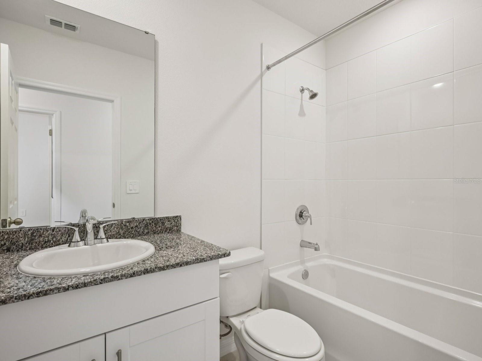Can you make this description for VillaMar for MLS with a warm but sales appeal: This versatile floorplan offers four bedrooms, two full baths and family room, complemented by an open-concept kitchen, dining area, and great room designed for gathering and entertaining.