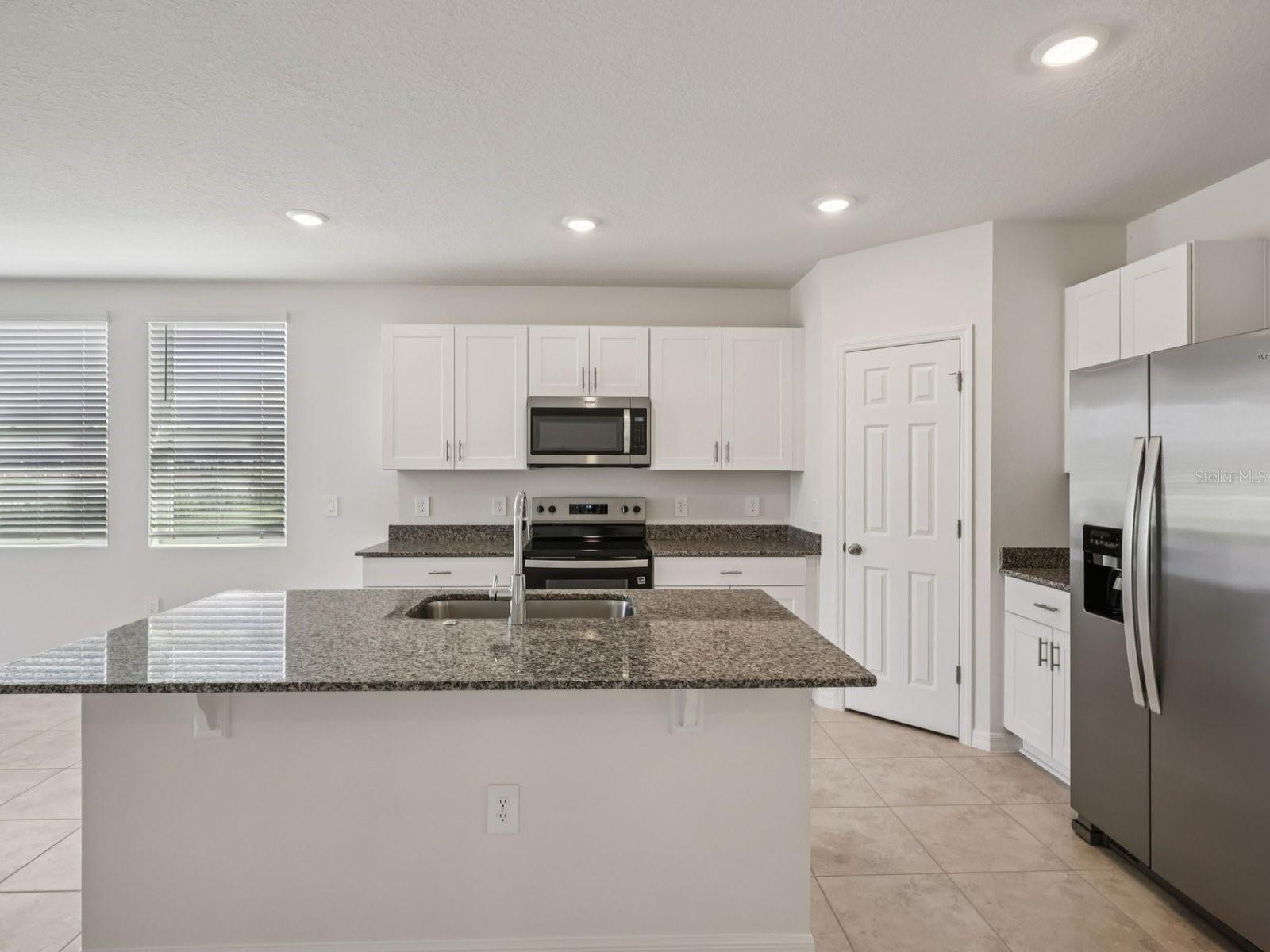 Can you make this description for VillaMar for MLS with a warm but sales appeal: This versatile floorplan offers four bedrooms, two full baths and family room, complemented by an open-concept kitchen, dining area, and great room designed for gathering and entertaining.