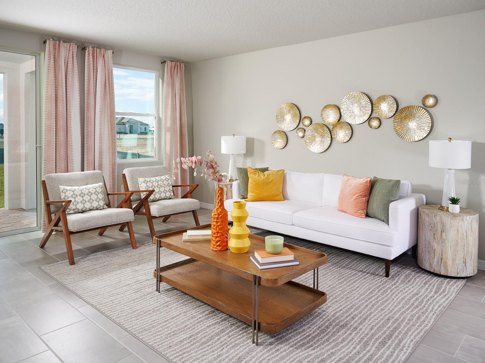 Welcome to Two Rivers, where comfort, space, and modern living come together in a thoughtfully designed home. This versatile floorplan features five spacious bedrooms and two full baths, offering plenty of room for growing families, guests, or flexible living arrangements. The open-concept kitchen flows seamlessly into the dining area and great room, creating a warm and inviting space perfect for entertaining, family gatherings, or relaxing evenings at home. With its functional layout, generous living areas, and welcoming atmosphere, this home is designed to fit your lifestyle while providing the perfect backdrop for creating lasting memories.