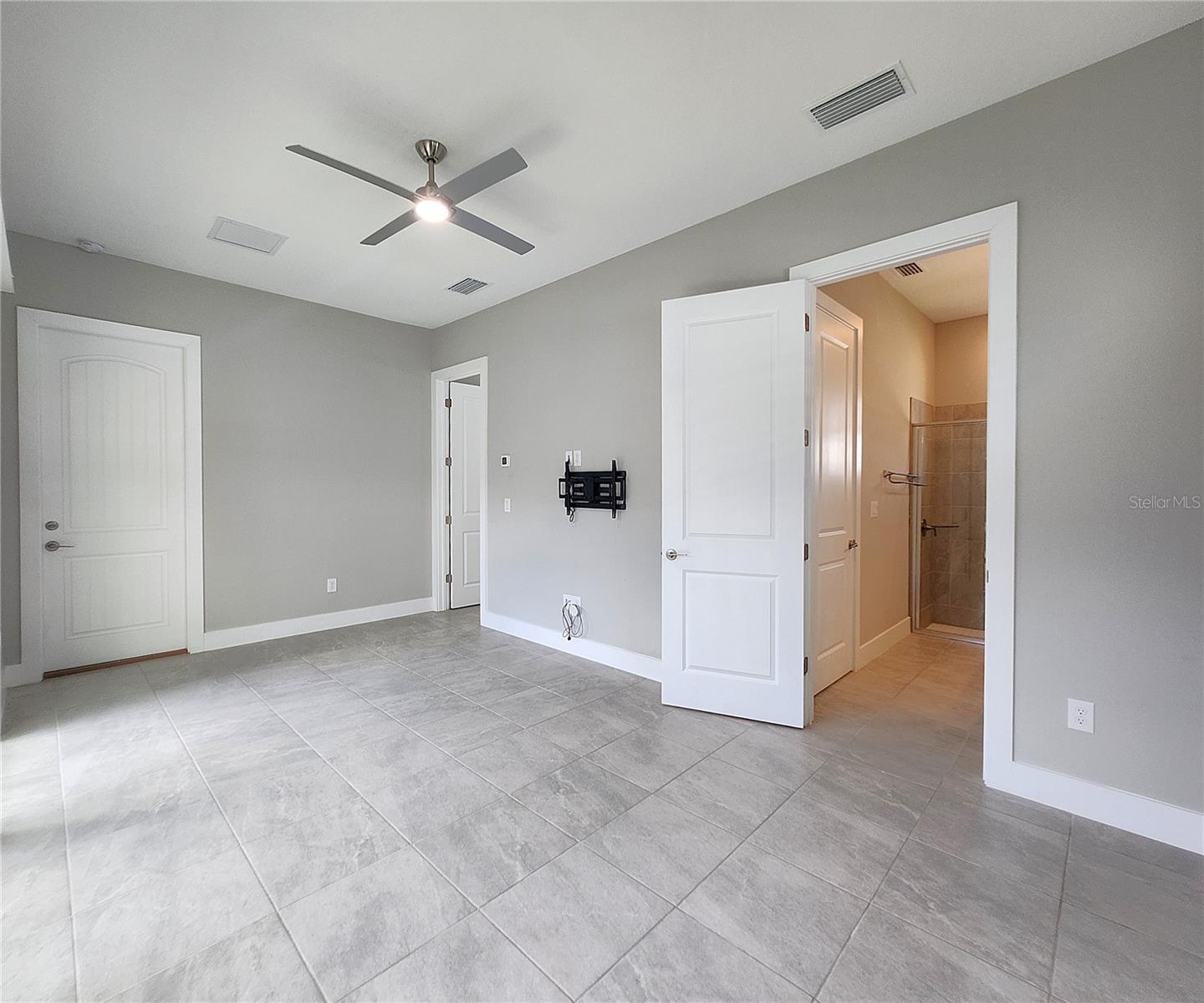 Guest House measures approximately 20x23, includes 1 bedroom, 1 full bathroom, living room, impact glass sliders with remote controlled shades.