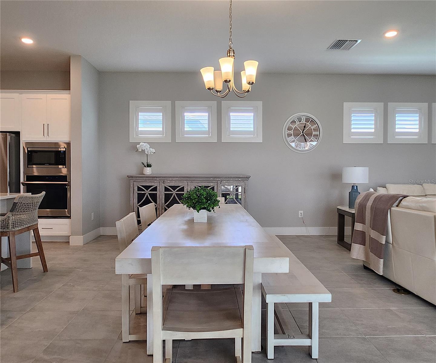 Main home: plantation shutters, remote controlled shade, large living room, dining area, large open kitchen, 3 bedrooms, 2 full bathrooms, 1 guest bathroom, interior laundry room
