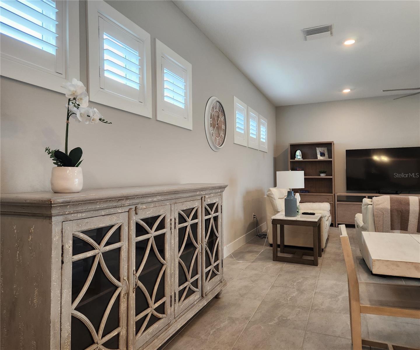 Main home: plantation shutters, remote controlled shade, large living room, dining area, large open kitchen, 3 bedrooms, 2 full bathrooms, 1 guest bathroom, interior laundry room