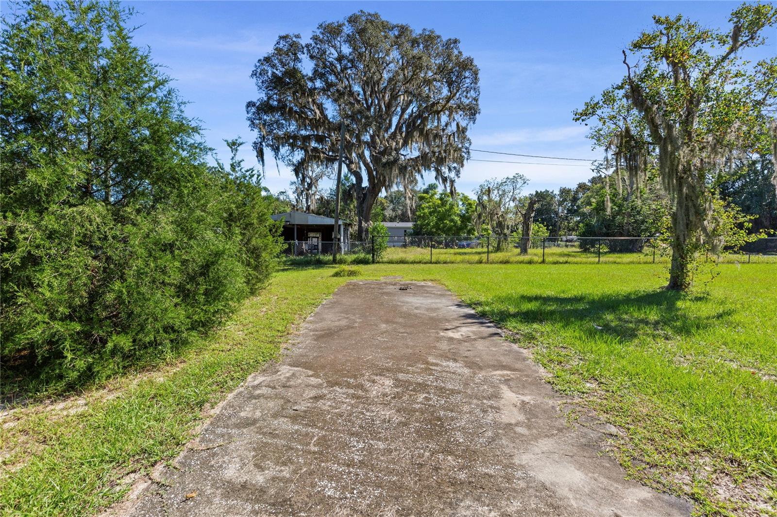 Concrete pad on adjacent lot