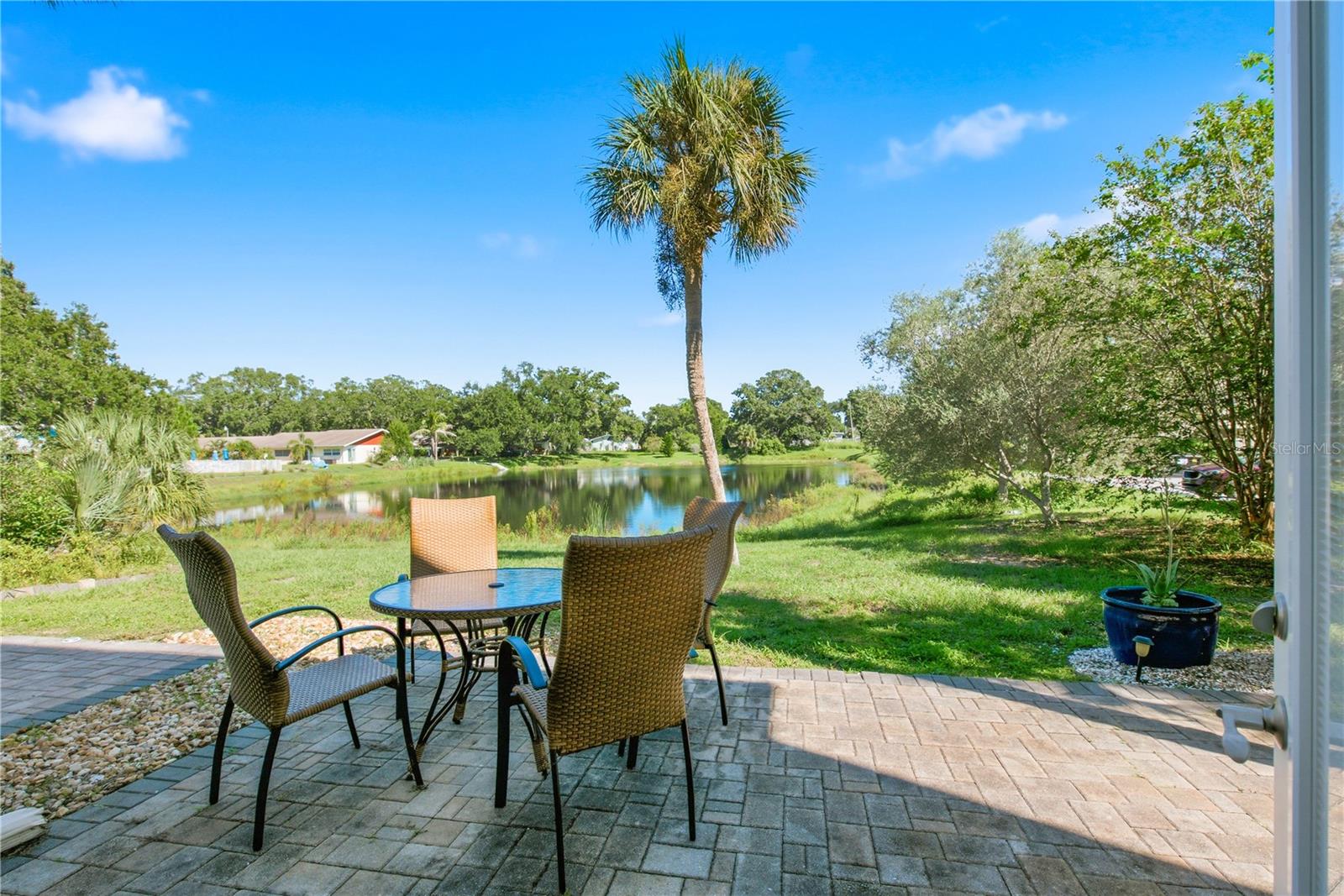 Oversized patio with pond views