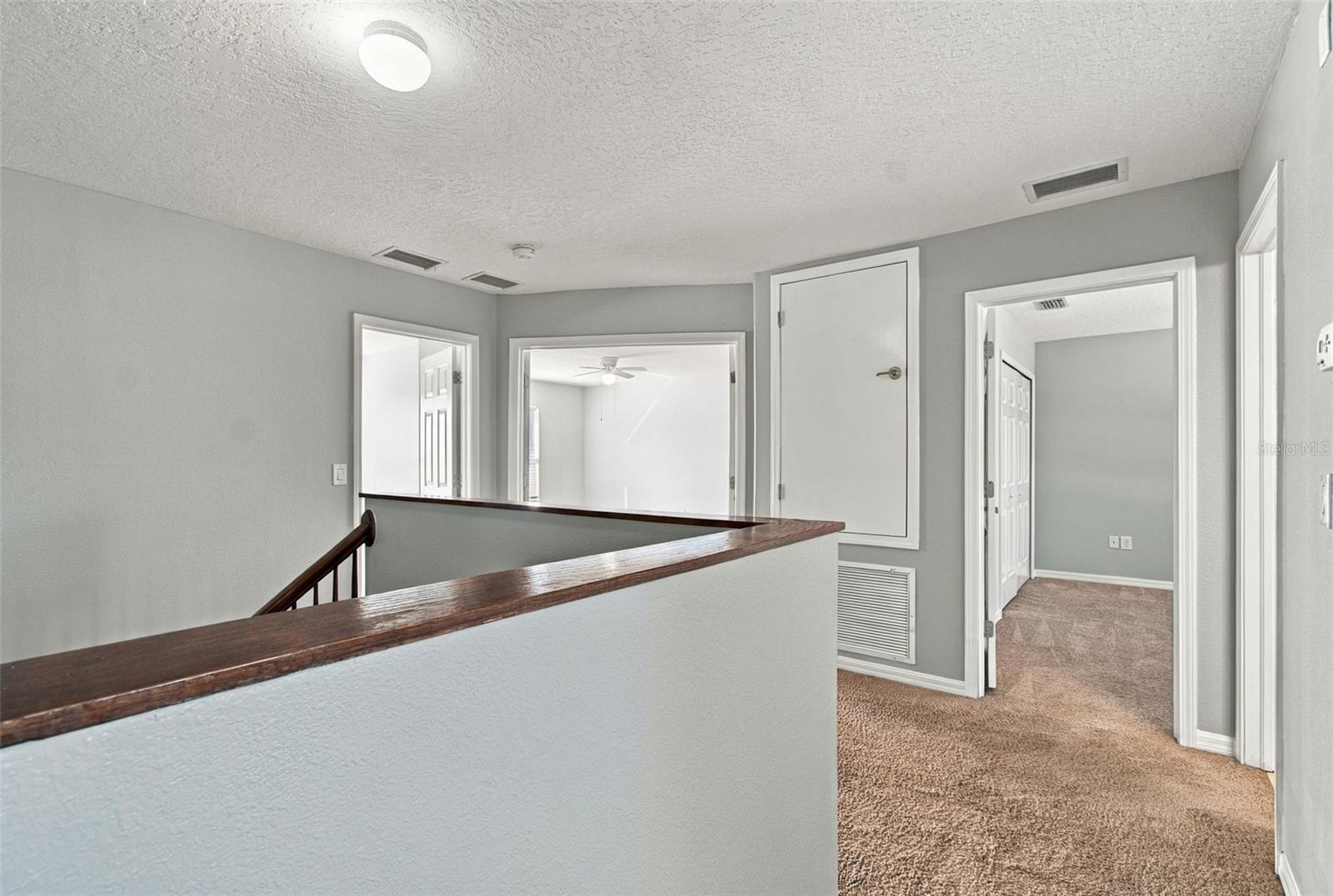Upstairs vire to Peimary Bedroom, Bonus or 4th Bedroom, A/C Closet,2nd and 3rd Bedrooms
