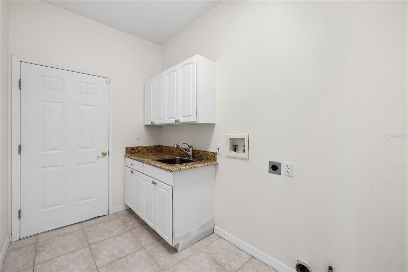 12009 BREWSTER DRIVE, Tampa, FL 33626
