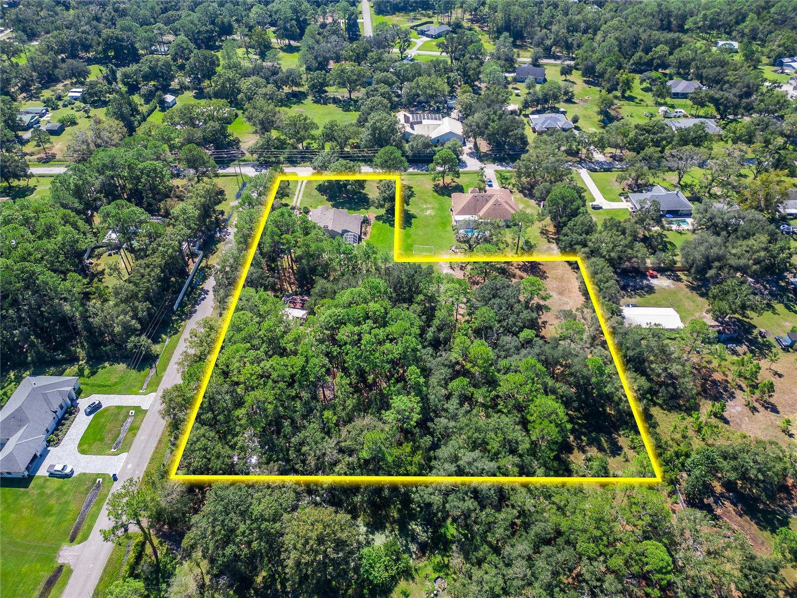 3.66 Acres with entrances on Olcott Dr and Lindenhurst.