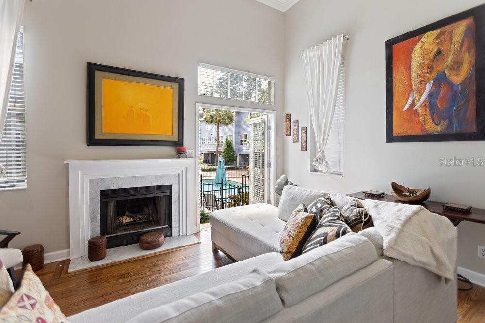 Living room with view of pool area